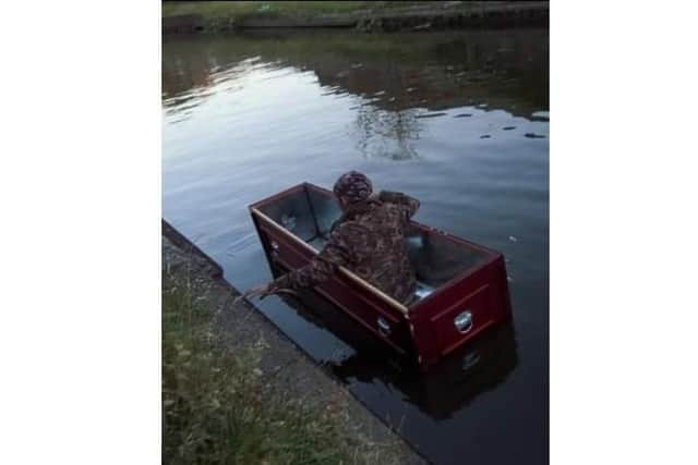 Terri is sure the coffin was never occupied - except in this picture of her partner Paul taking it for a spin.