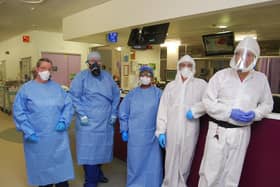 Some of the ICU team in full PPE working on a 12 hour shift in the ICU red zone.