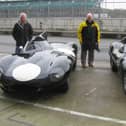 (L-R) Gary Pearson, his father John and his brother John with the restored Jaguar D-Type
