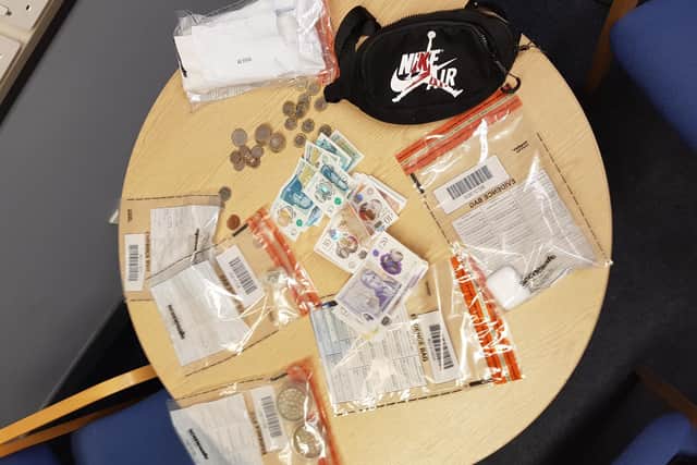 The items dropped on the ground in Olympic Way