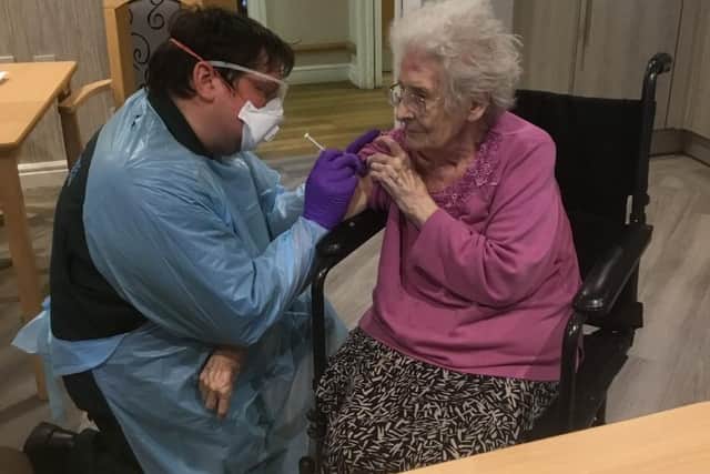 A resident receiving her vaccine at St Anns in Kettering.
