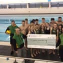 Members of Northampton Water Polo Club celebrate a £1,000 GRANT from Persimmon Homes Midlands