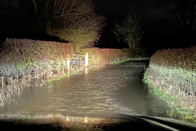 Police reported numerous rural roads flooded following Wednesday night's torrential rain