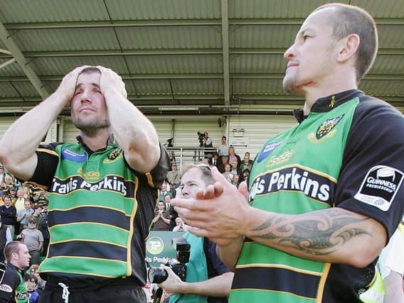 Ben Cohen and Carlos Spencer show their dismay following Saints' relegation in April, 2007