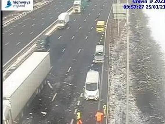 Highways England cameras showed the smash involving a lorry on the M1 just before 10am