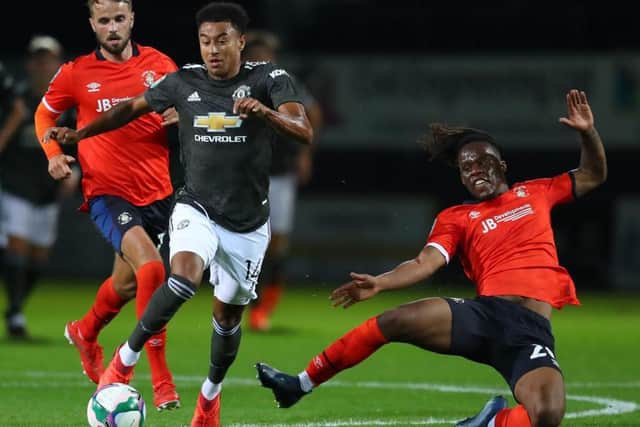 Peter Kioso challenges Jesse Lingard during Luton's League Cup tie with Man United earlier in the season. Picture: Getty.