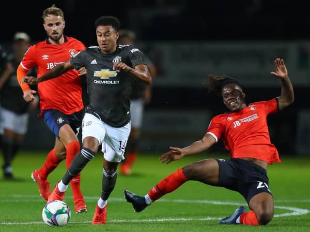 Peter Kioso challenges Jesse Lingard during Luton's League Cup tie with Man United earlier in the season. Picture: Getty.
