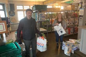 The Lamplighter owner Paul Hanna and The Swan and Helmet owner Teresa McCarthy in the food bank