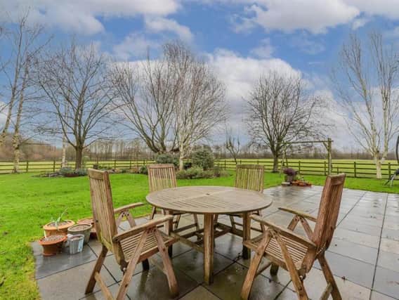 This beautiful barn conversion set on an attractive plot of 0.3 of an acre has just come onto the market - with amazing countryside views.