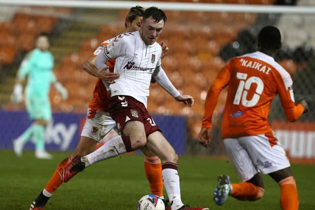 Ryan Edmondson in action for the Cobblers against Blackpool (Pictures: Pete Norton)