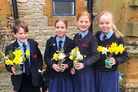Winchester House students taking part in the 'flowers for friends' scheme.