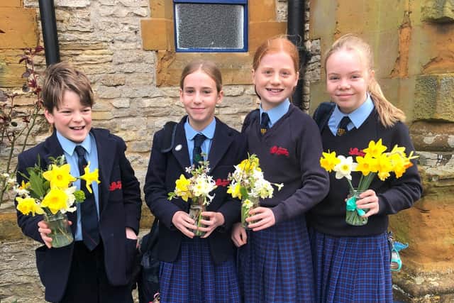 Winchester House students taking part in the 'flowers for friends' scheme.
