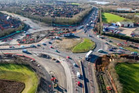 This image shows the road widening that has taken place on the A45 approach to the roundabout, bottom of the image, with the kerbs and footpath in position