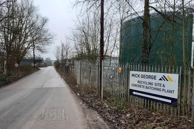 The entrance to the Mick George site in Lower Ecton Lane. Mick George has offered to meet residents of the caravan park but says it has had no previous complaints since it has been on site.