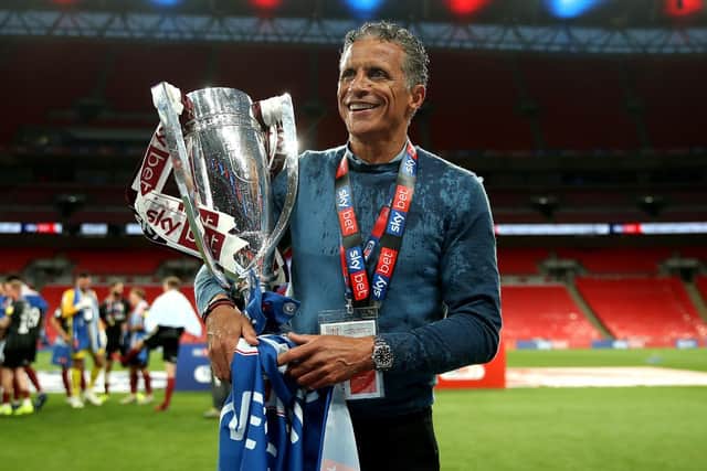 Keith Curle with the league two play-off winners' trophy