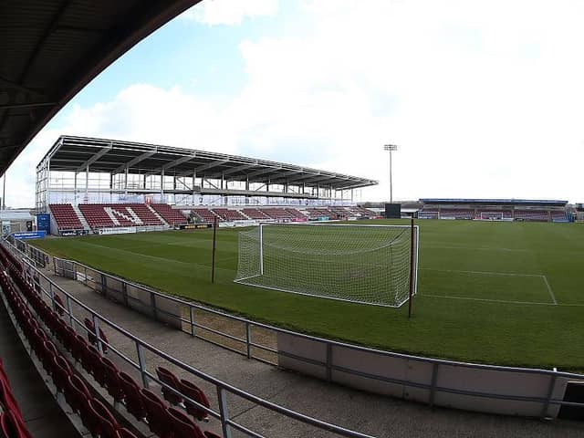 Work on the upper tier of Sixfields' east stand remains unfinished years after it started. Photo: Getty Images