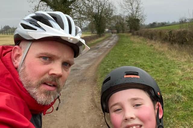 Jacob started the challenge in the rain, with his dad Chris yesterday (February 14).