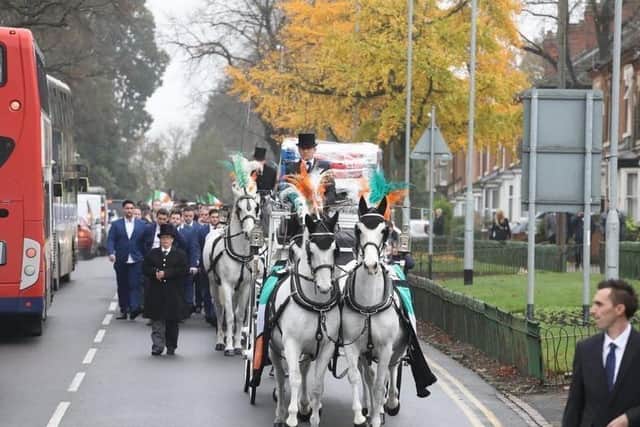 The funeral procession in Bowling Green Road.
