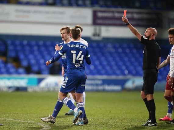 Darren Drysdale sends off Flynn Downes in stoppage-time on Tuesday.
