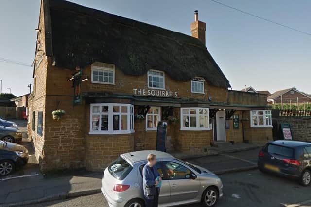 A man burst into the Squirrels Inn in Duston and threatened staff and customers with a hammer. He believed someone there had beaten up his son.