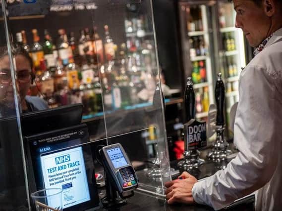 Pubs and restaurants have been given their first indication of when they can welcome customers back.