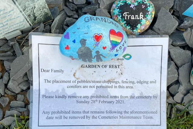 A notice was left on graves to inform families that personal touches need to be removed.
