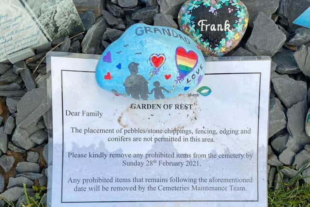 A notice was left on graves to inform families that personal touches need to be removed.
