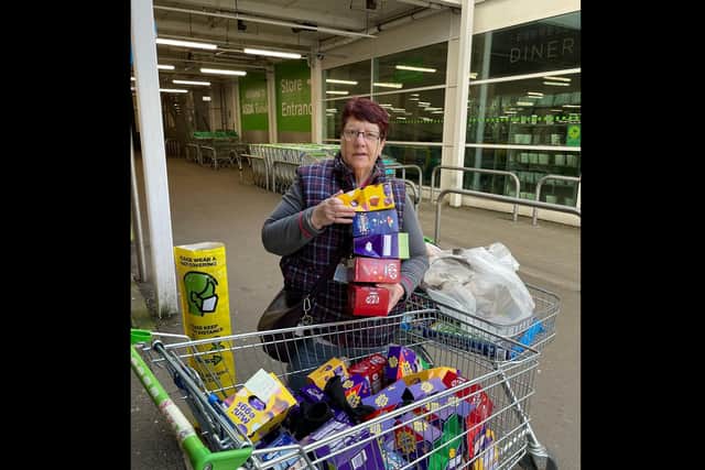 Jeanette with a trolley load of Easter eggs from Asda in Rushden