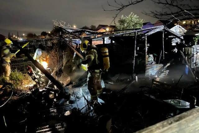 Firefighters tackle Tuesday night's blaze at an allotments in Kettering