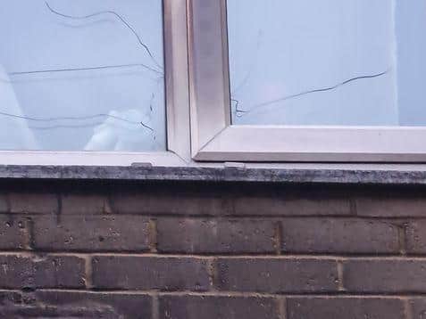 The smoke damage has also caused windows to crack.