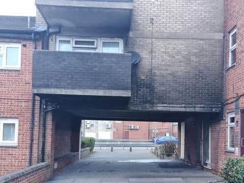 Simon's flat is on both sides of the walkway where the fire was.