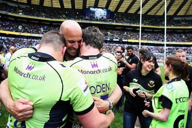 Jim Mallinder celebrates with Dylan Hartley and Ben Foden
