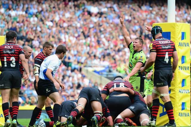 Dylan Hartley celebrates as Alex Waller burrows over for the dramatic winning try
