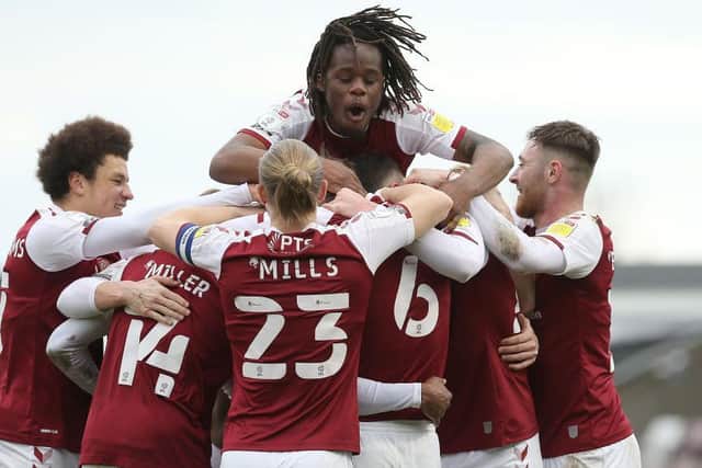 The Cobblers players celebrate after Sam Hoskins goal made it 4-0 against Portsmouth (Pictures: Pete Norton)