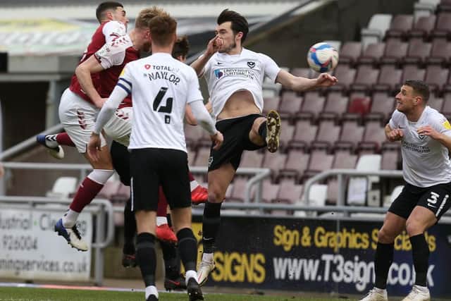 Ryan Watson heads home to put the Cobblers 2-0 ahead