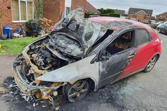 Justin Kirk's family car was set alight outside their home on March 4.