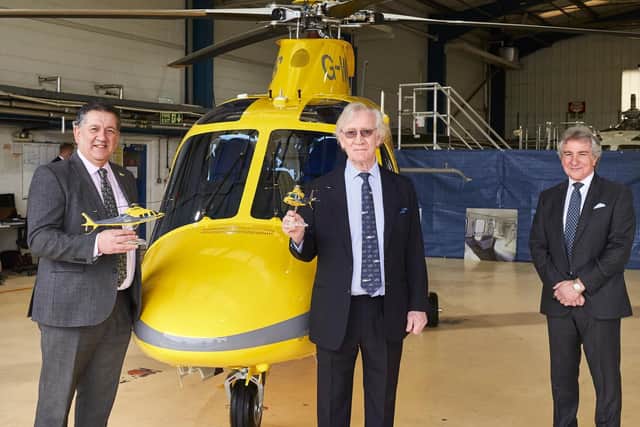 Charity CEO Andy Williamson with David George (Chairman Sloane Helicopters) and Jeremy Awenat (MD Sloane Helicopters)