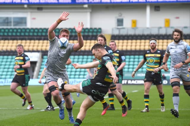 Tom James in action for Saints against Sale
