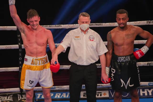 Carl Fail is all smiles as he is declared the winner of his first professional fight, beating Jordan Dujon on points (Picture: MTK Global Twitter - @MTKGlobal)