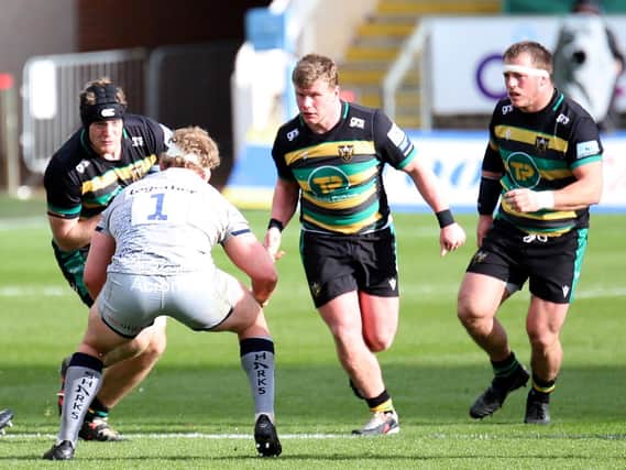 Reece Marshall (centre) in action against Sale (picture: Peter Short)