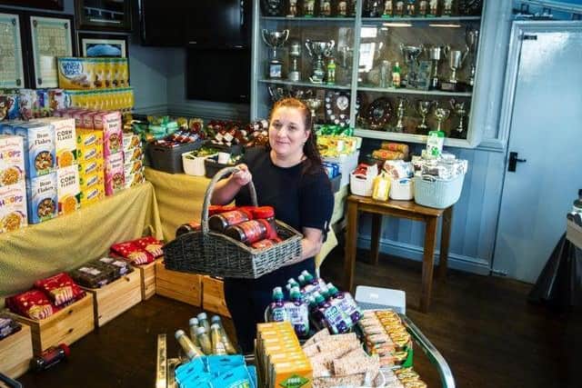 Teresa McCarthy-Dixon launched a weekly food larder to help those affected by the pandemic. Now she is going above and beyond to make sure her customers can still celebrate St Patrick's Day. Photo: Kirsty Edmonds.