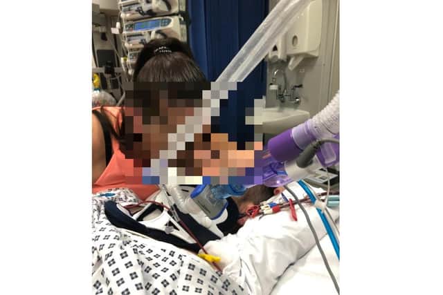 A Northampton man is searching for answers as to who "left him for dead" at the side of a road in Kings Heath following the motorbike accident that paralyzed him.