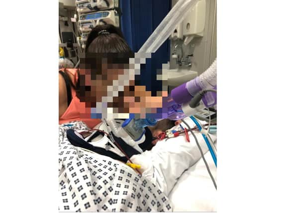 A Northampton man is searching for answers as to who "left him for dead" at the side of a road in Kings Heath following the motorbike accident that paralyzed him.