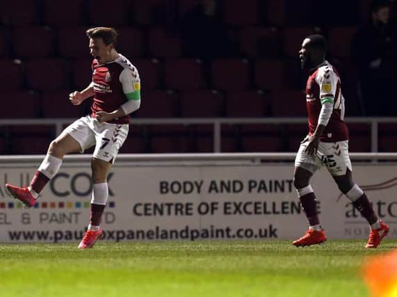 Sam Hoskins shows his delight after netting the Cobblers' winner against Oxford United (Pictures: Pete Norton)