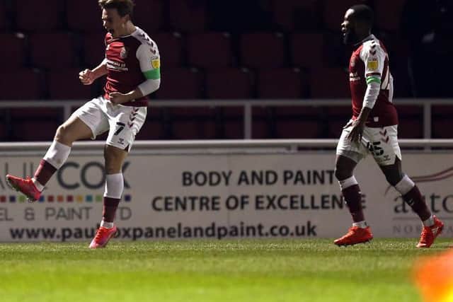 Sam Hoskins shows his delight after netting the Cobblers' winner against Oxford United (Pictures: Pete Norton)