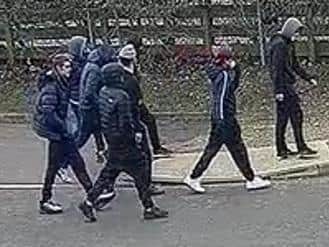 Police want to find this group caught walking by CCTV in Brackley close to where a man was mugged