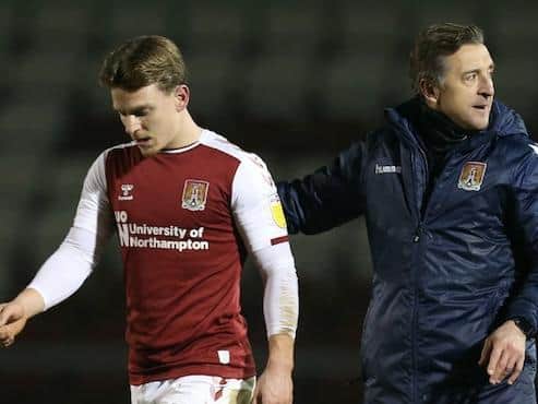 Jon Brady had a chat with Sam Hoskins on the pitch following Tuesday's win. Pictures: Pete Norton.
