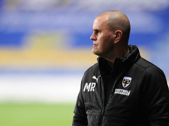 Mark Robinson was appointed Dons head coach last month.