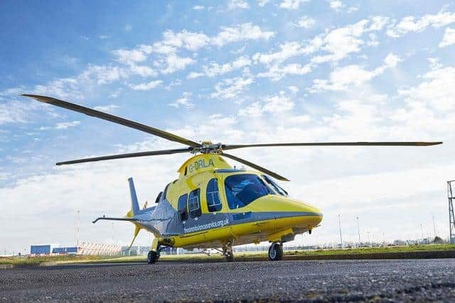 An air ambulance helicopter was scrambled after a car crashed into a tree near Desborough this morning (Monday).