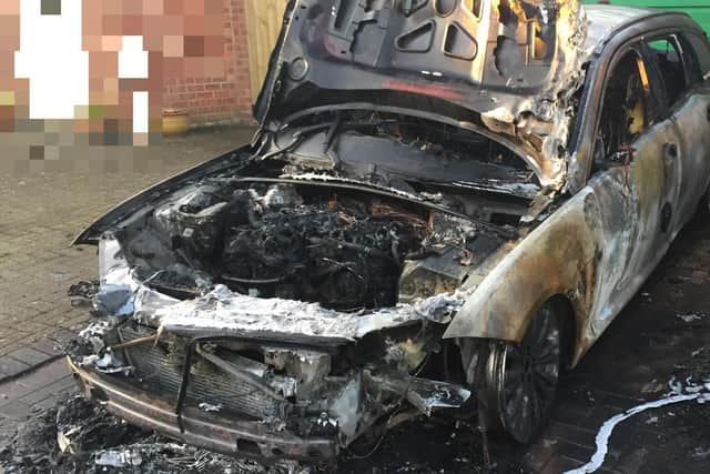 This is what was left of a luxury Jaguar XF following last night's shocking arson attack